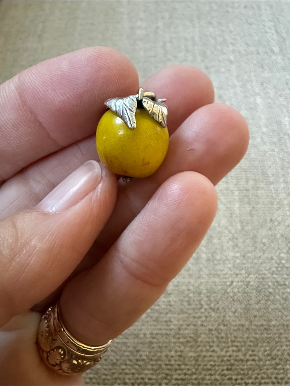 Vintage glass “Golden Apple” with Sterling Silver leaves charm.